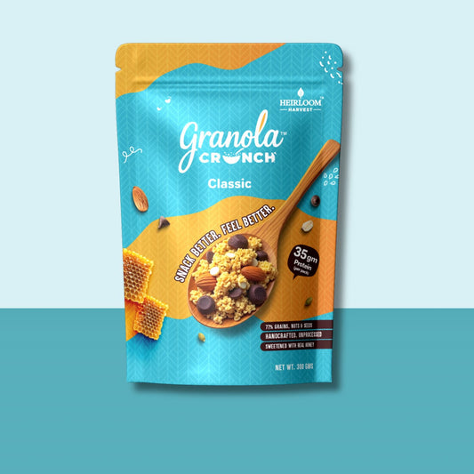 Granola Crunch packaging with blue and orange design on a light blue background